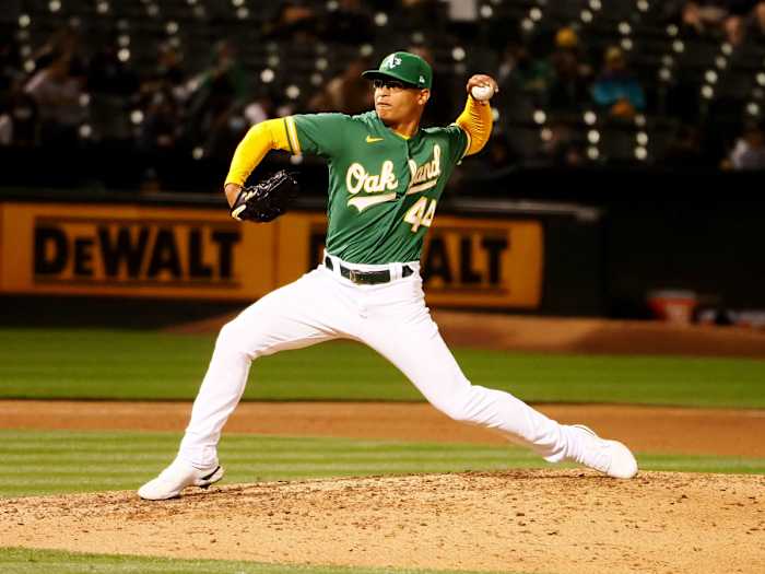 Jun 10, 2021; Oakland, California, USA; Oakland Athletics relief pitcher Jesus Luzardo (44) pitches the ball against the Kansas City Royals during the eighth inning at RingCentral Coliseum.